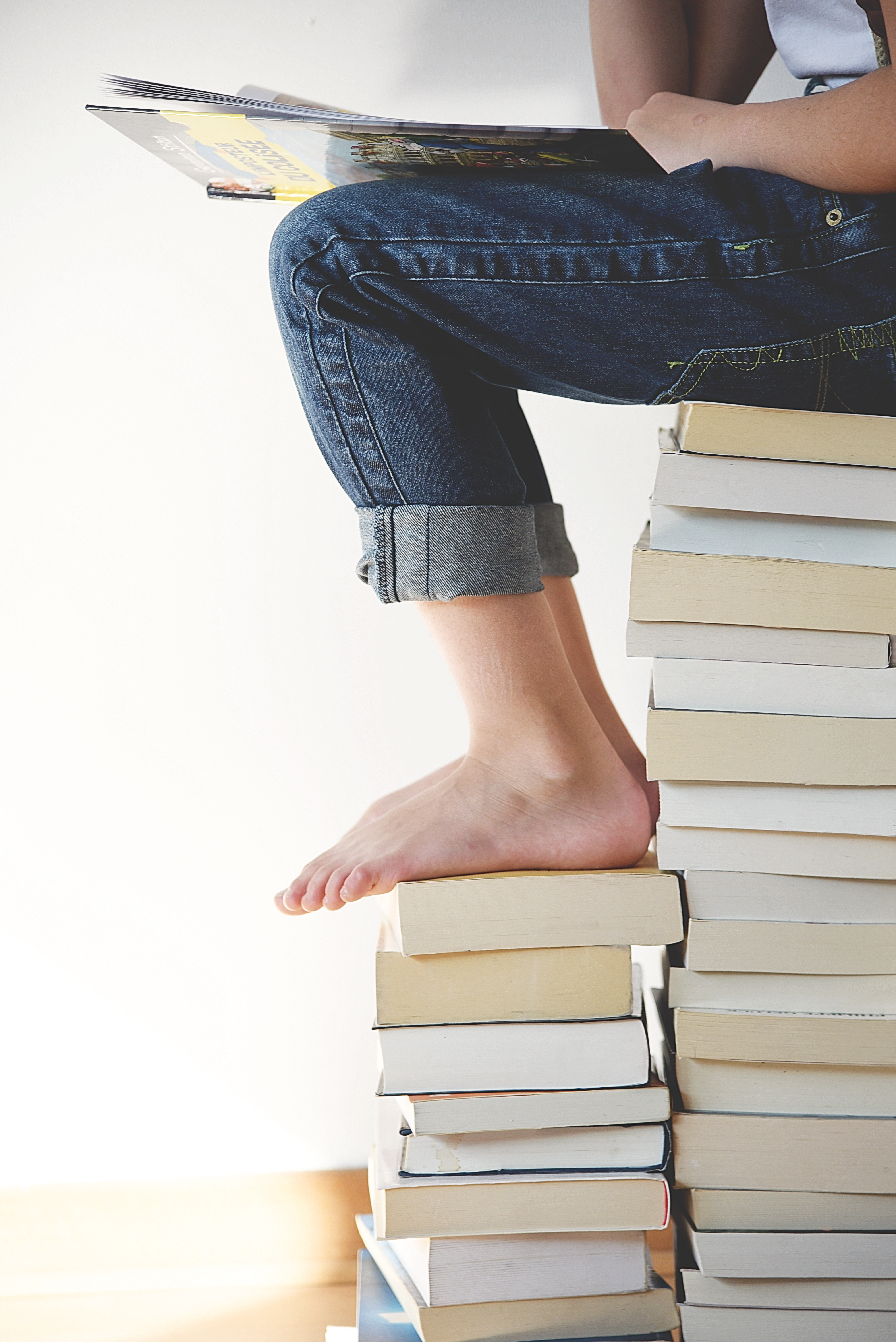 feet on book pile